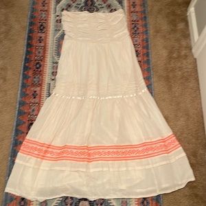 Free people dress size large. It’s a cream color not white.